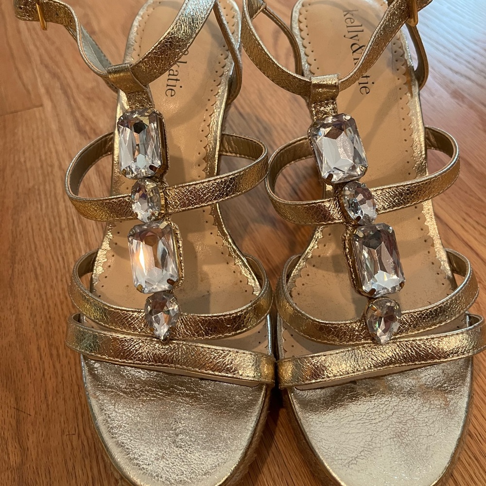 Womens shoes.  Size 8 1/2.  4” rope wedge.  Ankle strap.  Metallic gold. Worn 1x
